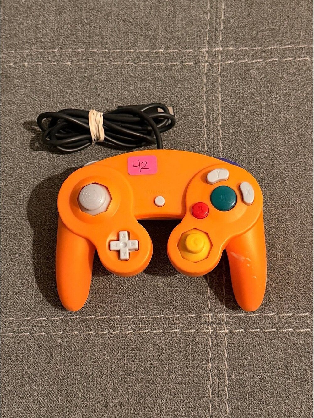 Orange Nintendo GameCube controller